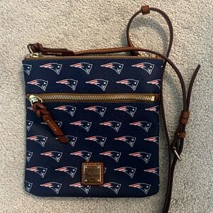 Never used New England Patriots Dooney and Bourke cross body.